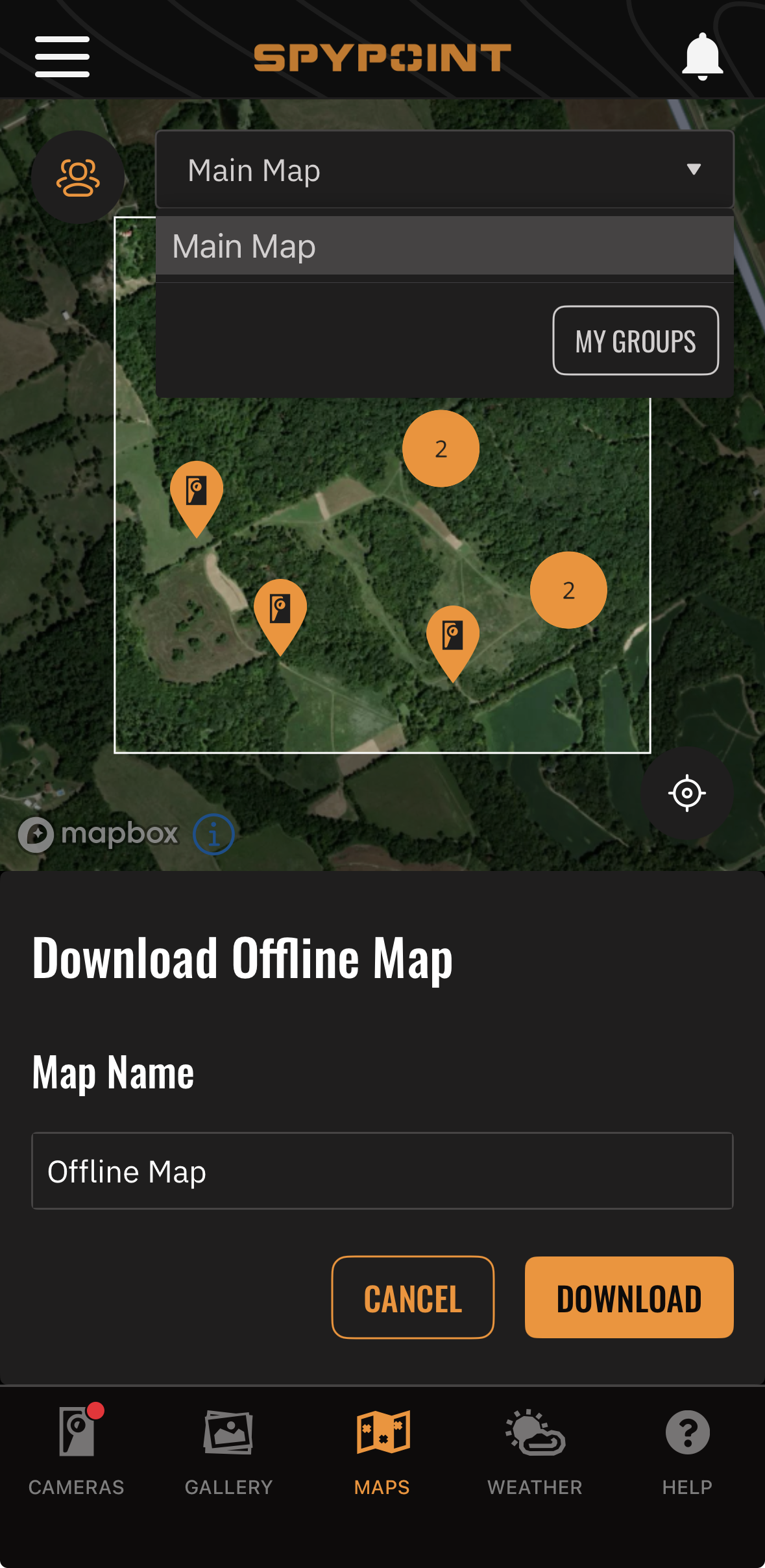 Blog-385_Image-1-SPYPOINT-App-Offline-Maps SPYPOINT app showing the option to download an offline hunting map with cellular trail camera locations marked on the property.